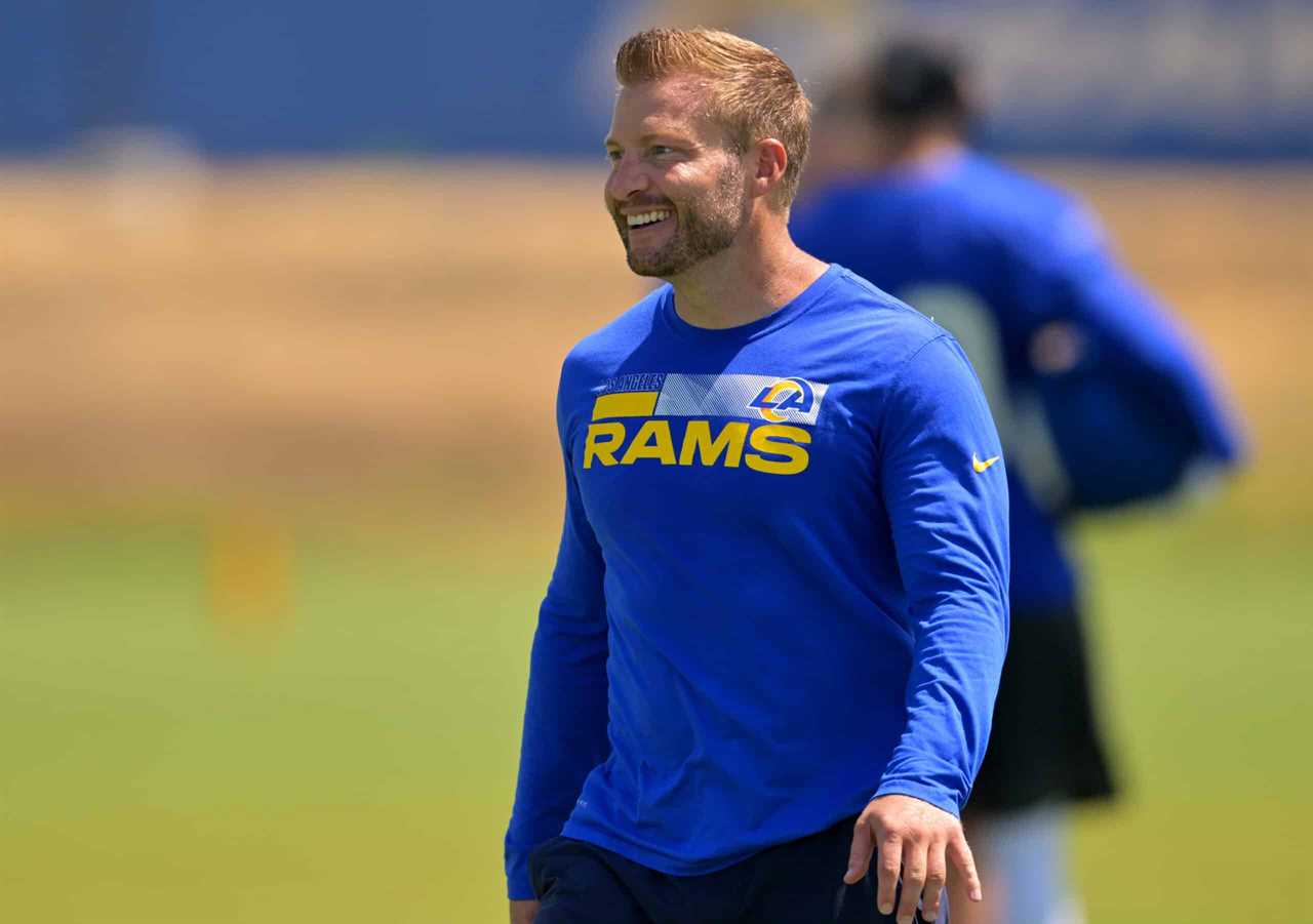 Head coach Sean McVay of the Los Angeles Rams smiles on the field during mini camp on June 8, 2022 at the team's facility at California Lutheran University in Thousand Oaks, California.