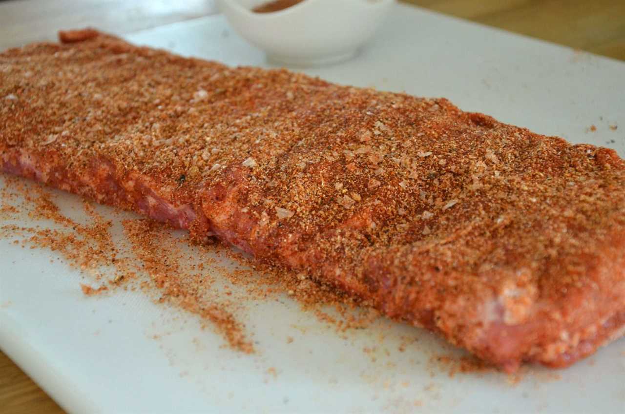 raw ribs with BBQ seasoning