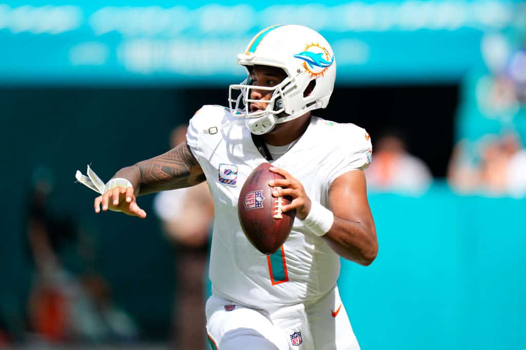Tua Tagovailoa #1 of the Miami Dolphins runs the ball against the New York Giants during the second quarter at Hard Rock Stadium on October 08, 2023 in Miami Gardens, Florida.