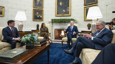 President Joe Biden speaks with Congressional leaders in the White House Oval Office, February 27, 2024