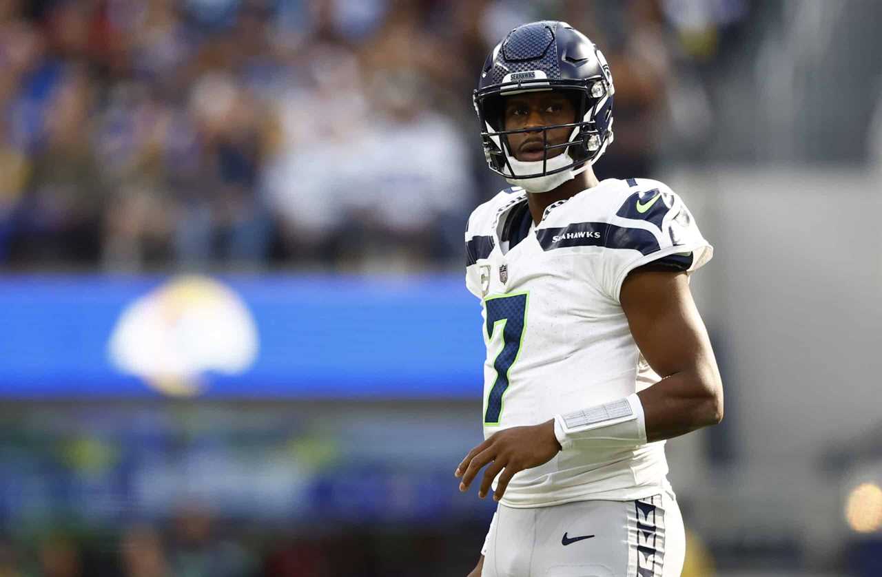 Geno Smith #7 of the Seattle Seahawks looks on in the game against the Los Angeles Rams during the first half at SoFi Stadium on November 19, 2023 in Inglewood, California.