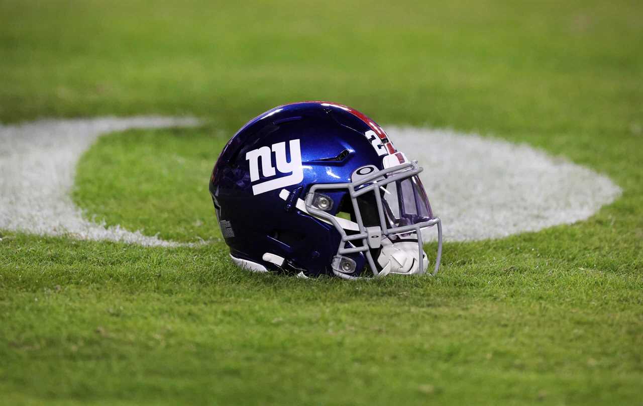 A New York Giants helmet sits on the field prior to the start of the game against the Washington Commanders at FedExField on December 18, 2022 in Landover, Maryland.