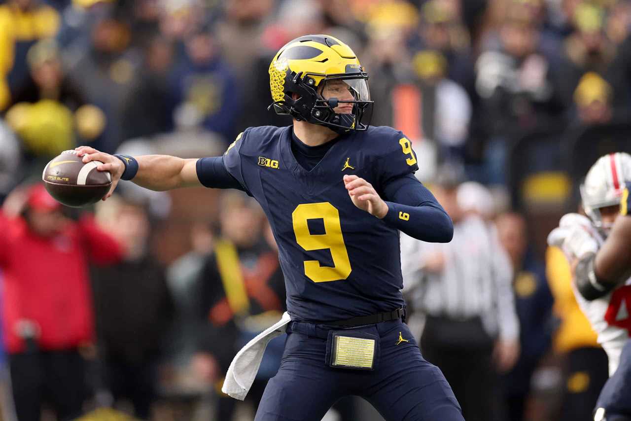 ANN ARBOR, MICHIGAN - NOVEMBER 25: J.J. McCarthy #9 of the Michigan Wolverines passes the ball against the Ohio State Buckeyes at Michigan Stadium on November 25, 2023 in Ann Arbor, Michigan.