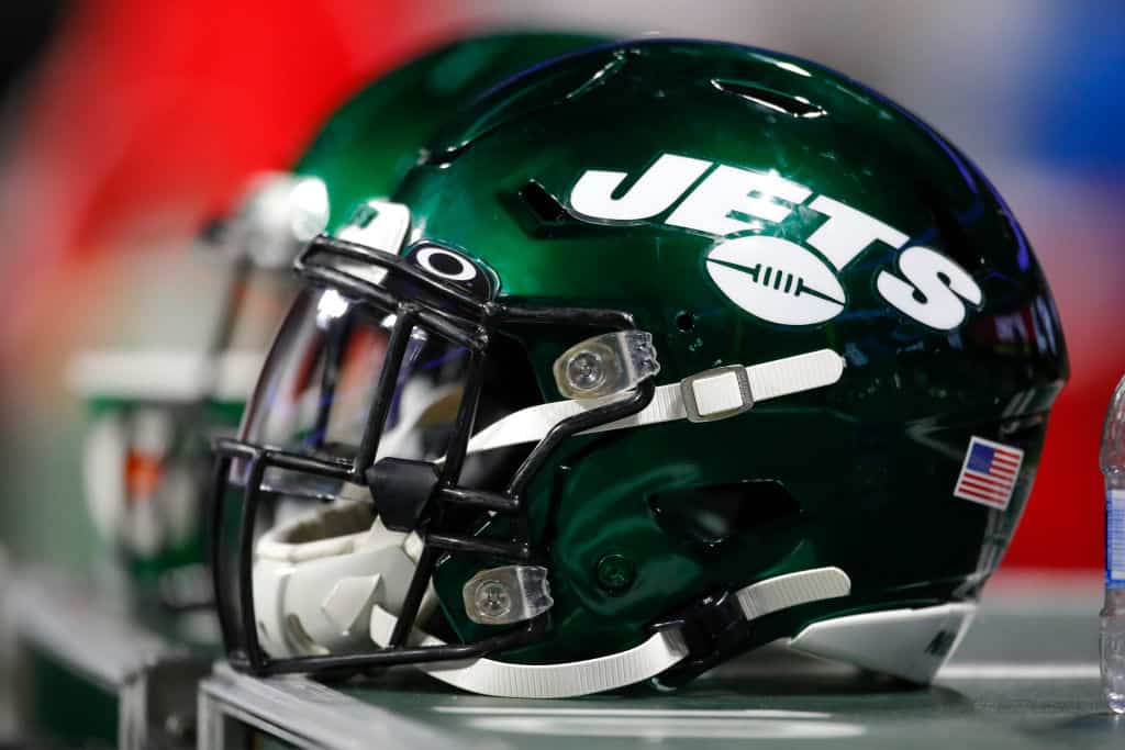A New York Jets helmet sits on an equipment case during the second half of an NFL preseason game against the Atlanta Falcons at Mercedes-Benz Stadium on August 15, 2019 in Atlanta, Georgia.
