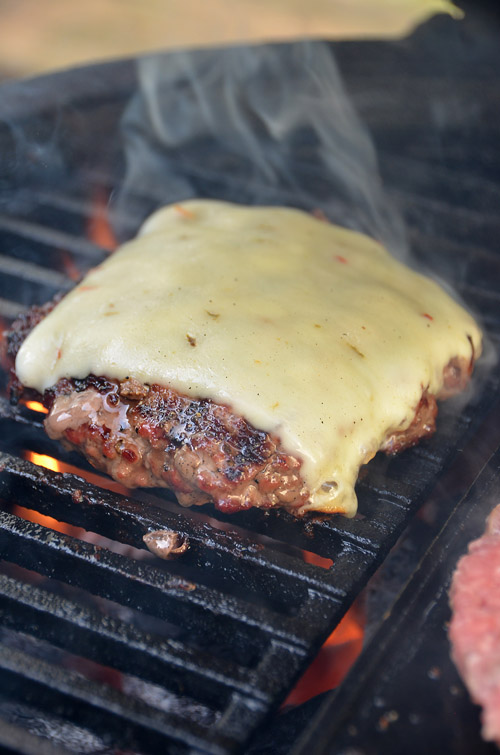 Avocado, Chorizo, and Pepper Jack Cheeseburger cooked on a Big Green Egg