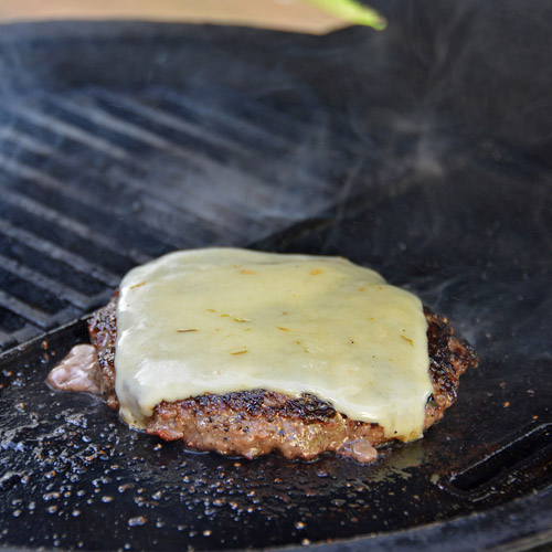 Avocado, Chorizo, and Pepper Jack Cheeseburger cooked on a Big Green Egg