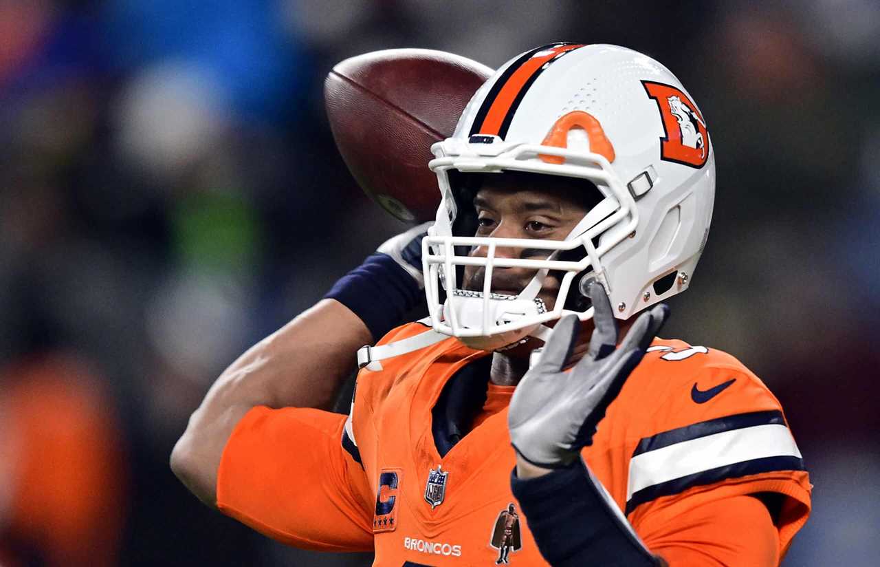 DENVER, COLORADO - DECEMBER 24: Quarterback Russell Wilson #3 of the Denver Broncos warms up prior to the game against the New England Patriots at Empower Field At Mile High on December 24, 2023 in Denver, Colorado.