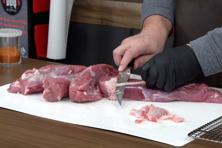 removing the silverskin from the pork loin