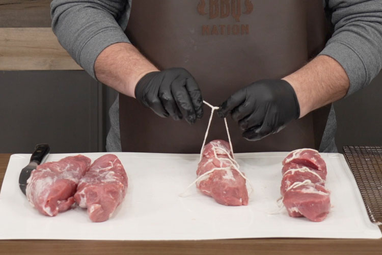 tying up pork tenderloins with string