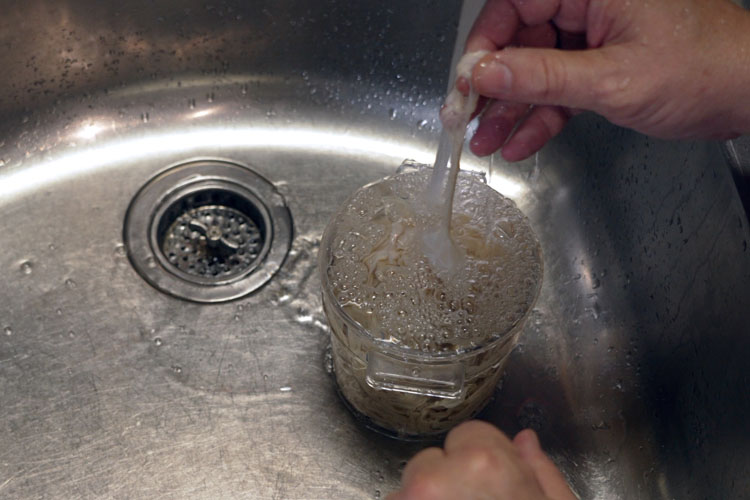 rinsing hog casings under running water