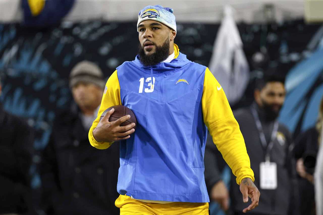 Keenan Allen #13 of the Los Angeles Chargers warms up prior to a game against the Jacksonville Jaguars in the AFC Wild Card playoff game at TIAA Bank Field on January 14, 2023 in Jacksonville, Florida.