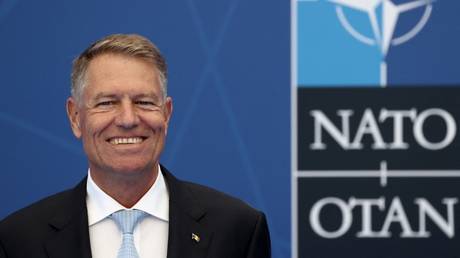 Klaus Iohannis poses for a photograph during a NATO summit in Brussels, Belgium, June 14, 2021