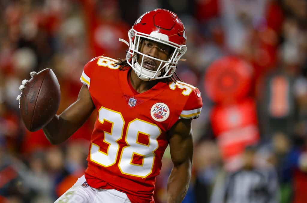 KANSAS CITY, MO - NOVEMBER 21: L'Jarius Sneed #38 of the Kansas City Chiefs runs with the ball after a fourth quarter interception against the Dallas Cowboys at Arrowhead Stadium on November 21, 2021 in Kansas City, Missouri. 