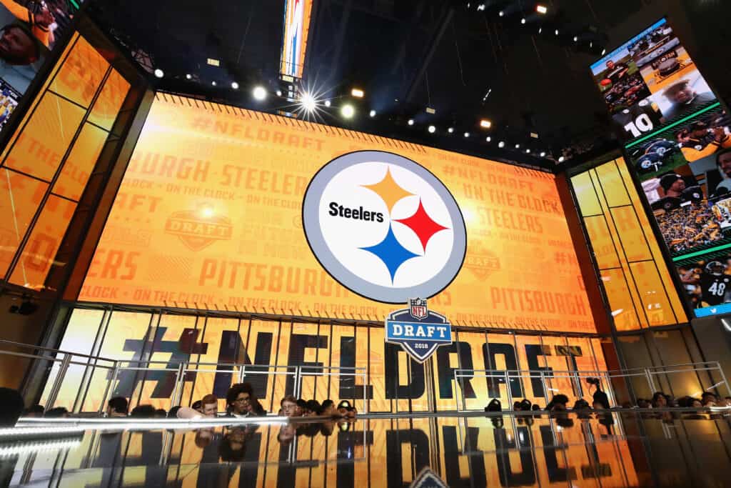 The Pittsburgh Steelers logo is seen on a video board during the first round of the 2018 NFL Draft at AT&T Stadium on April 26, 2018 in Arlington, Texas.
