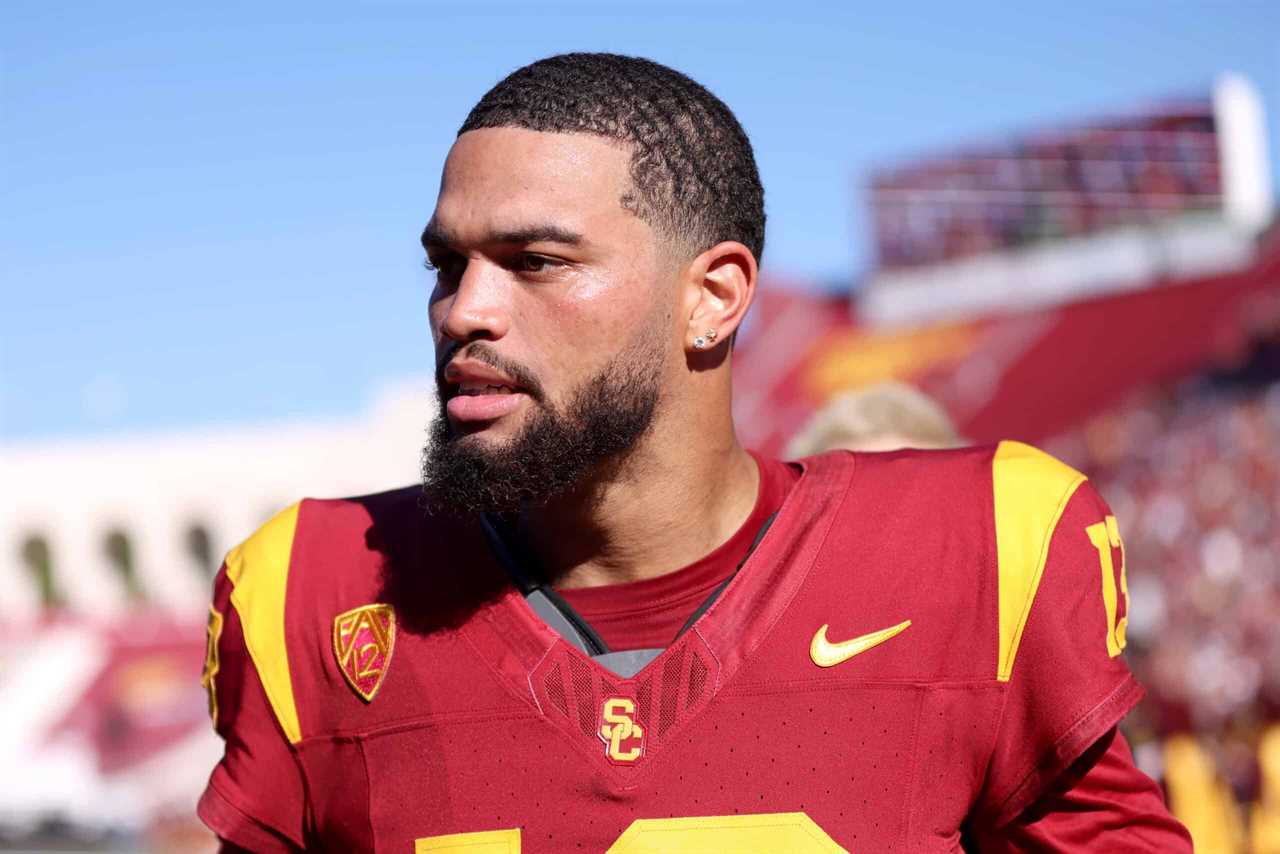 LOS ANGELES, CALIFORNIA - AUGUST 26: Caleb Williams #13 of the USC Trojans looks on prior to the game against the San Jose State Spartans at United Airlines Field at the Los Angeles Memorial Coliseum on August 26, 2023 in Los Angeles, California.