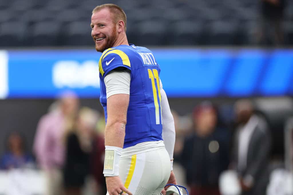 Carson Wentz #11of the Los Angeles Rams reacts before the game against the Washington Commanders at SoFi Stadium on December 17, 2023 in Inglewood, California. 