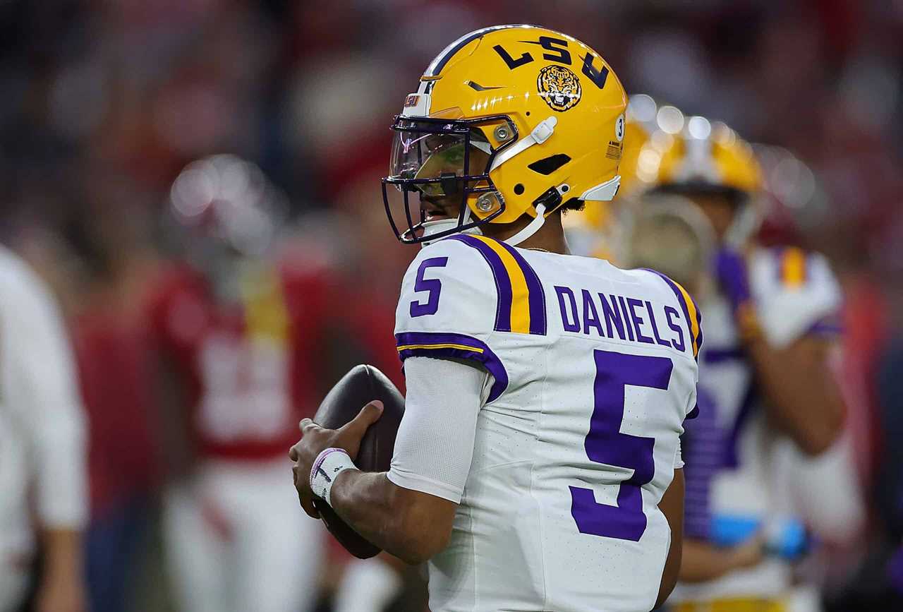 TUSCALOOSA, ALABAMA - NOVEMBER 04: Jayden Daniels #5 of the LSU Tigers warms up prior to facing the Alabama Crimson Tide at Bryant-Denny Stadium on November 04, 2023 in Tuscaloosa, Alabama.