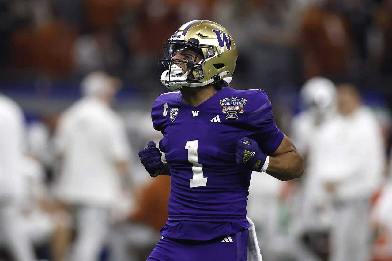 NEW ORLEANS, LOUISIANA - JANUARY 01: Rome Odunze #1 of the Washington Huskies reacts during the first half against the Texas Longhorns during the CFP Semifinal Allstate Sugar Bowl at Caesars Superdome on January 01, 2024 in New Orleans, Louisiana.