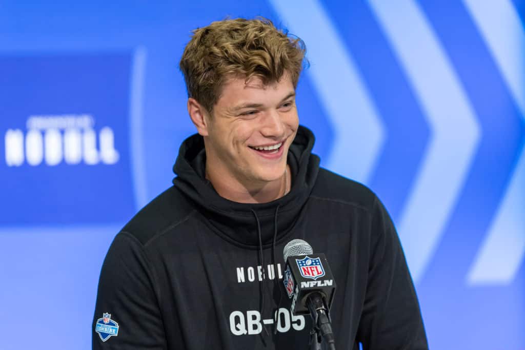 JJ McCarthy #QB05 of the Michigan Wolverines speaks to the media during the 2024 NFL Draft Combine at Lucas Oil Stadium on March 01, 2024 in Indianapolis, Indiana.