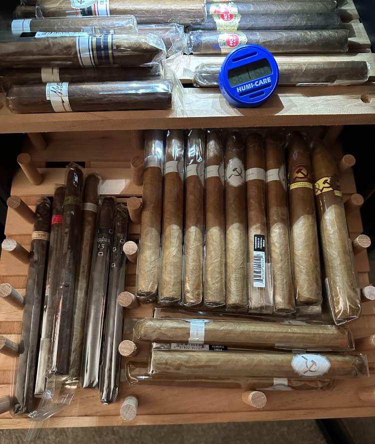 Cedar Shelves With Cigars Inside Humidor