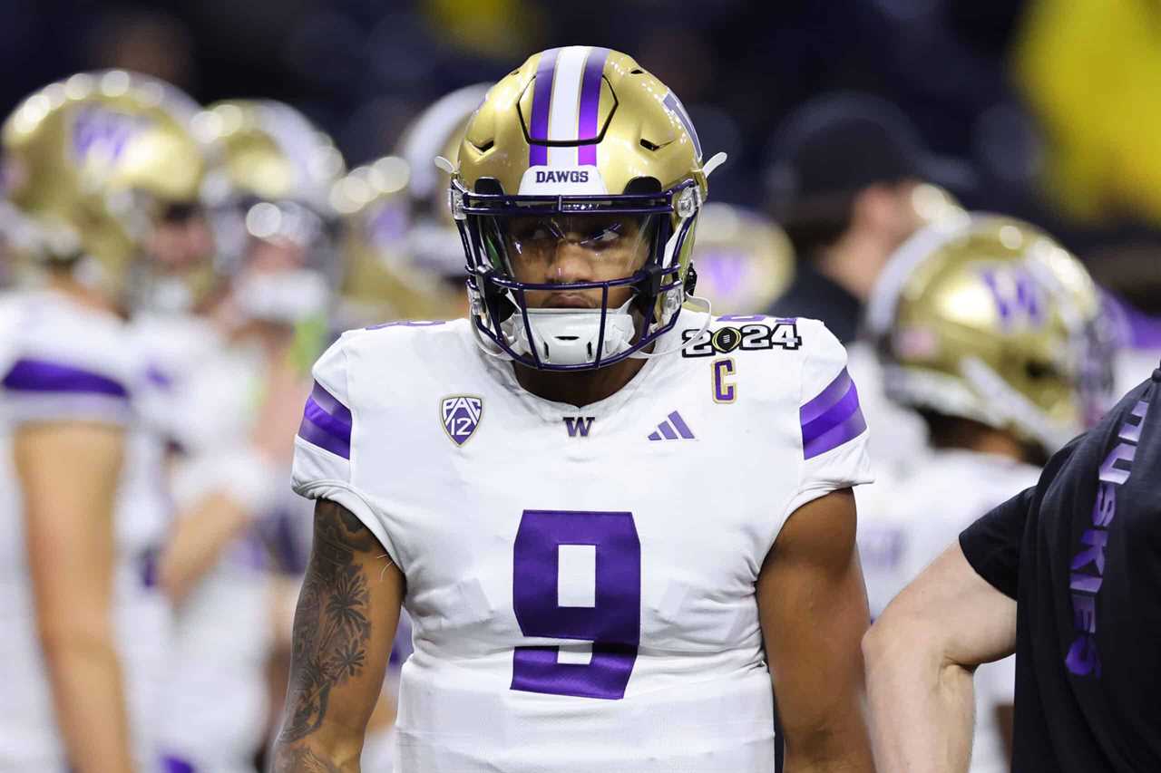 HOUSTON, TEXAS - JANUARY 08: Michael Penix Jr. #9 of the Washington Huskies looks on prior to the 2024 CFP National Championship game against the Michigan Wolverines at NRG Stadium on January 08, 2024 in Houston, Texas.