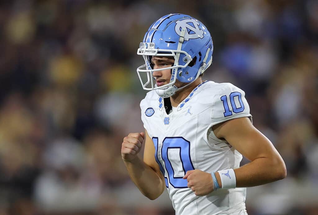 ATLANTA, GEORGIA - OCTOBER 28: Drake Maye #10 of the North Carolina Tar Heels reacts after passing for a touchdown against the Georgia Tech Yellow Jackets during the second quarter at Bobby Dodd Stadium on October 28, 2023 in Atlanta, Georgia.