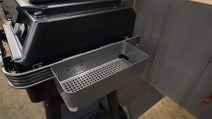 Traeger pop-and-lock storage bin accessory