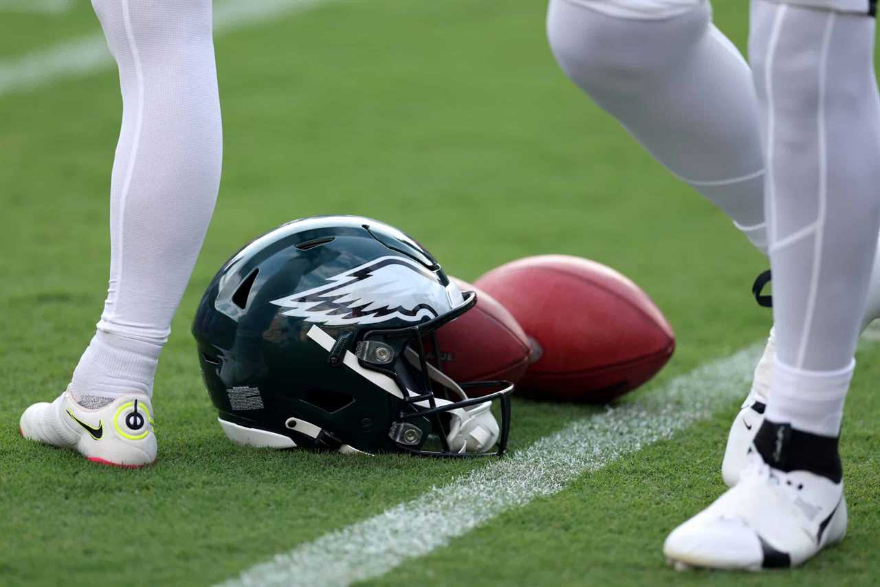 BALTIMORE, MARYLAND - AUGUST 12: A Philadelphia Eagles helmet sits on the grass before the start of a preseason game against the Baltimore Ravens at M&T Bank Stadium on August 12, 2023 in Baltimore, Maryland.