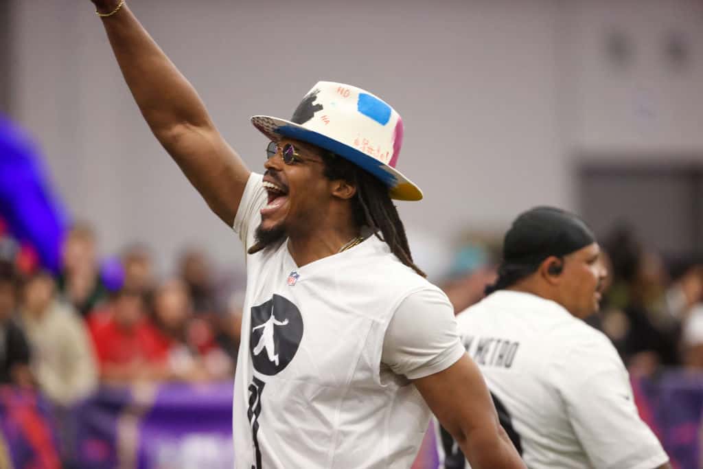 Former NFL quarterback Cam Newton celebrates during a celebrity flag football game at the Mandalay Bay Convention Center on February 09, 2024 in Las Vegas, Nevada.