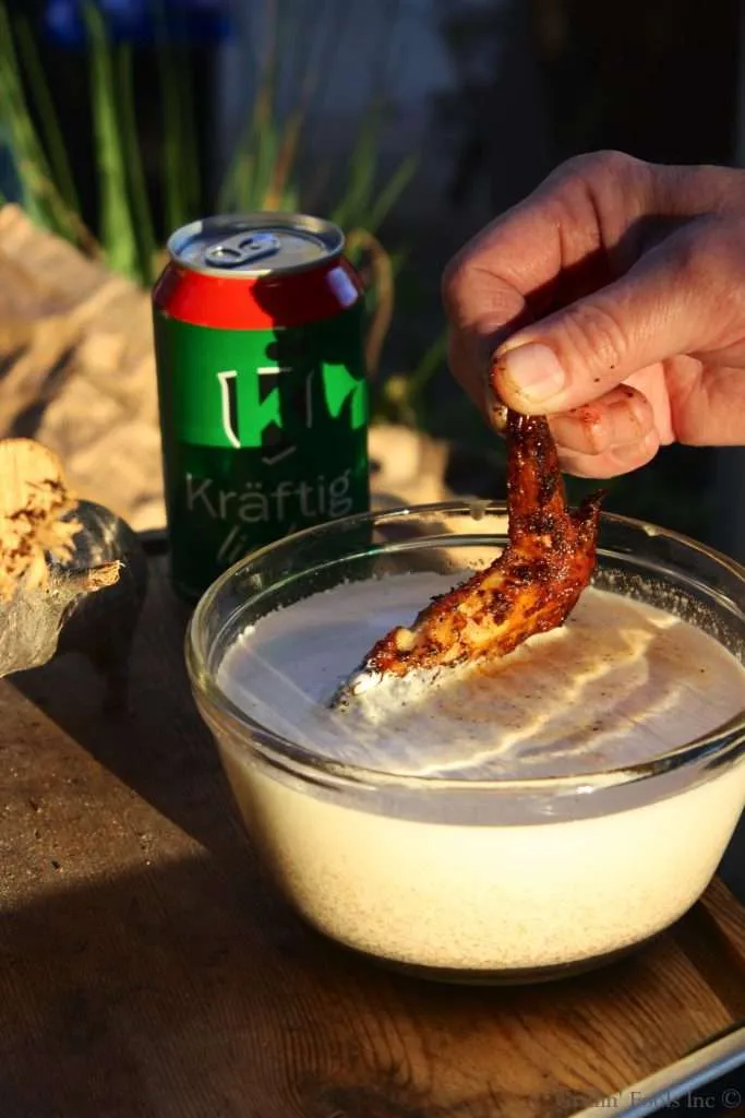 Chicken Wings Dunked in the Alabama White Sauce