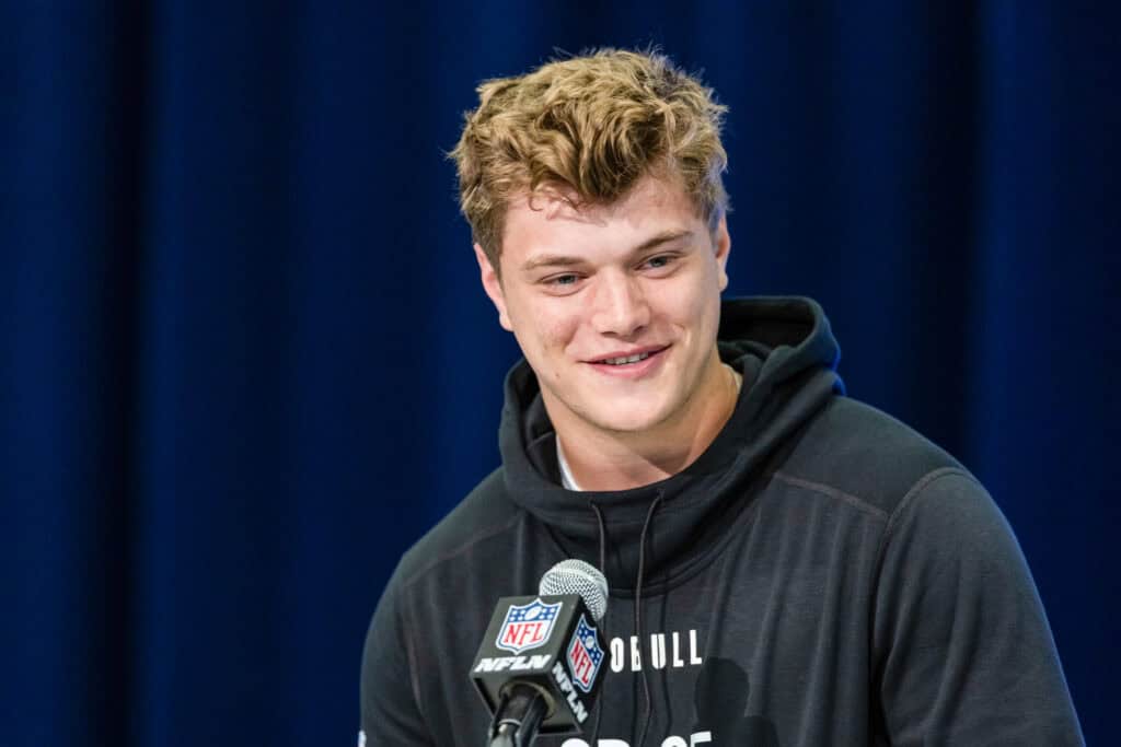 INDIANAPOLIS, INDIANA - MARCH 01: JJ McCarthy #QB05 of the Michigan Wolverines speaks to the media during the 2024 NFL Draft Combine at Lucas Oil Stadium on March 01, 2024 in Indianapolis, Indiana.