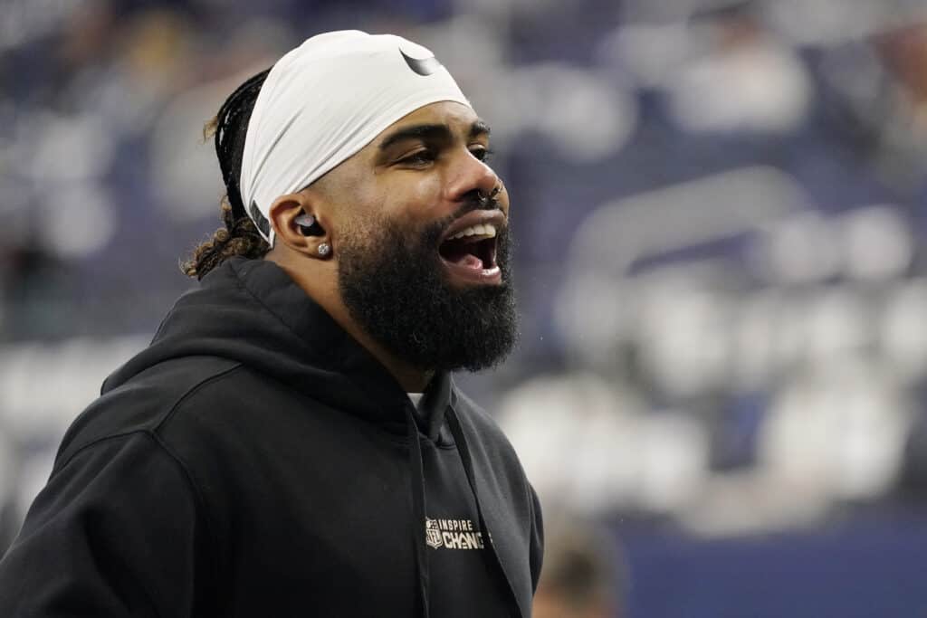 Ezekiel Elliott #21 of the Dallas Cowboys warms up prior to a game against the Philadelphia Eagles at AT&T Stadium on December 24, 2022 in Arlington, Texas.