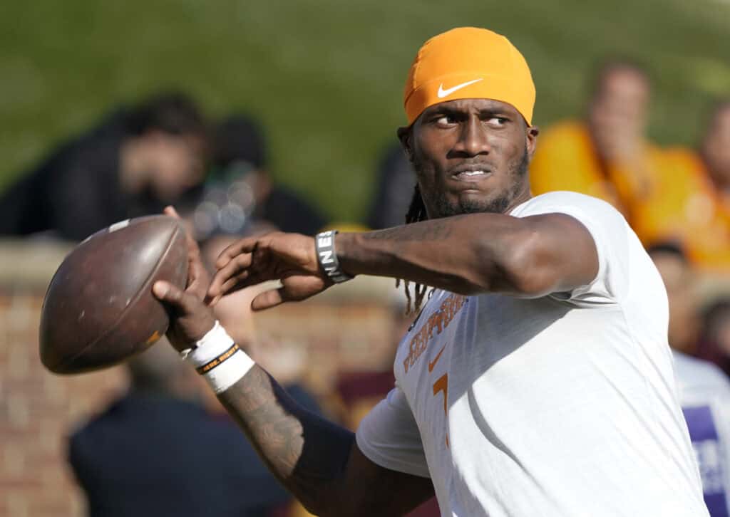 COLUMBIA, MISSOURI - NOVEMBER 11: Quarterback Joe Milton III #7 of the Tennessee Volunteers throws the ball as he warms up before a game against the Missouri Tigers at Faurot Field/Memorial Stadium on November 11, 2023 in Columbia, Missouri.