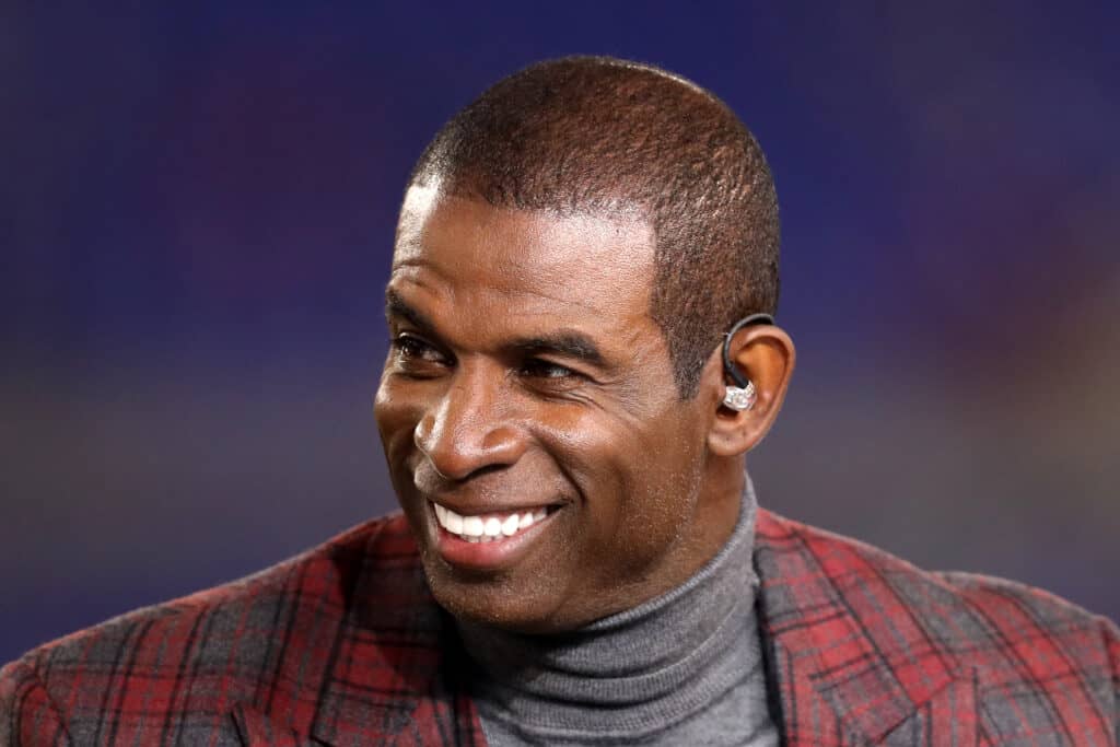 NFL Network analyst Deion Sanders appears on set during the Baltimore Ravens and Miami Dolphins game at M&T Bank Stadium on October 26, 2017 in Baltimore, Maryland.