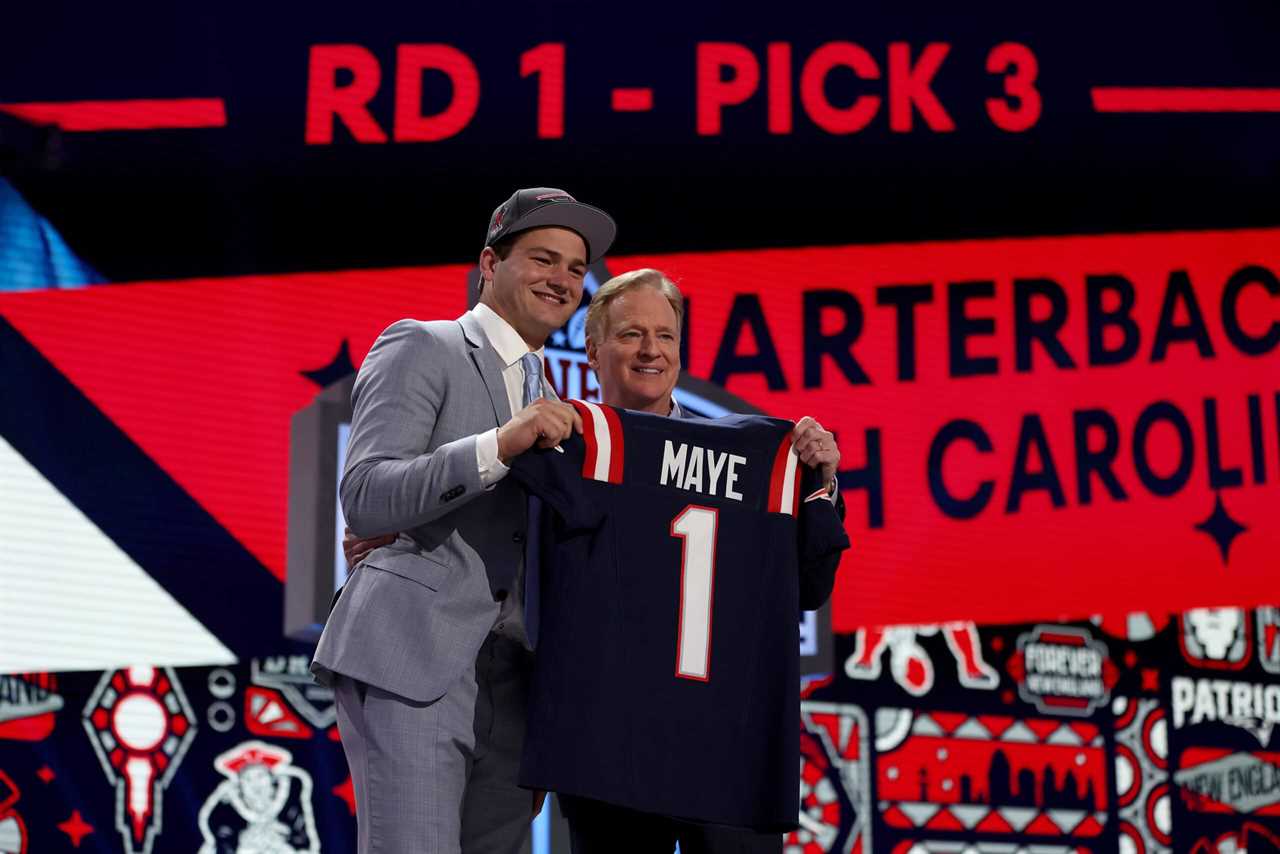 DETROIT, MICHIGAN - APRIL 25: (L-R) Drake Maye poses with NFL Commissioner Roger Goodell after being selected third overall by the New England Patriots during the first round of the 2024 NFL Draft at Campus Martius Park and Hart Plaza on April 25, 2024 in Detroit, Michigan.