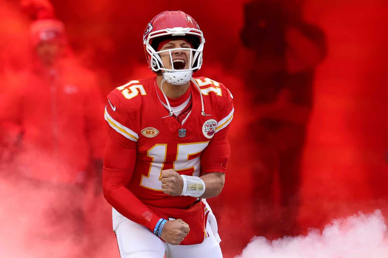 KANSAS CITY, MISSOURI - DECEMBER 31: Patrick Mahomes #15 of the Kansas City Chiefs runs onto the field before the game against the Cincinnati Bengals at GEHA Field at Arrowhead Stadium on December 31, 2023 in Kansas City, Missouri.