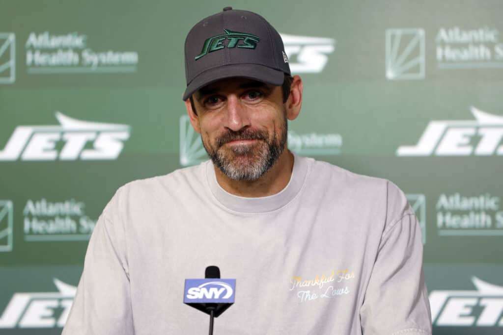 FLORHAM PARK, NEW JERSEY - MAY 21: Aaron Rodgers #8 of the New York Jets speaks to the media during the New York Jets OTA Offseason Workout at Atlantic Health Jets Training Center on May 21, 2024 in Florham Park, New Jersey. 