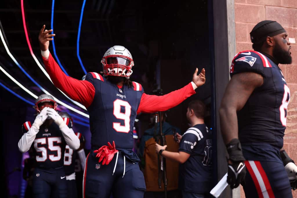 Matthew Judon #9 of the New England Patriots walks onto the field before his team's game against the Philadelphia Eagles at Gillette Stadium on September 10, 2023 in Foxborough, Massachusetts.