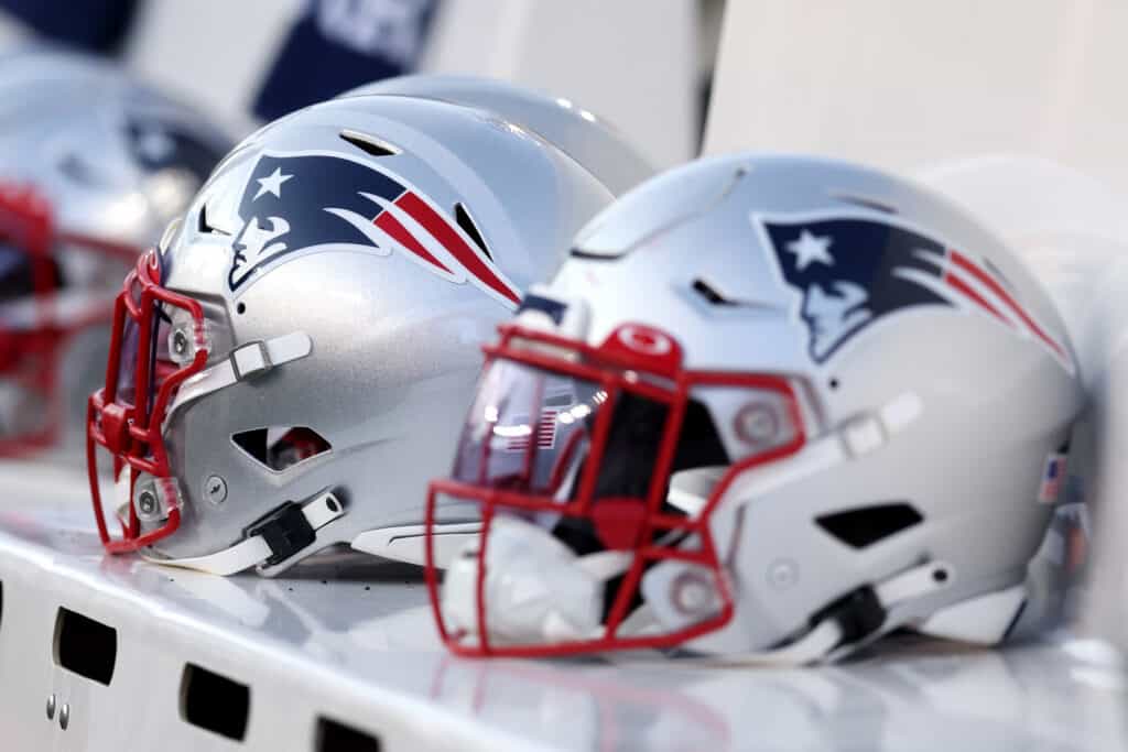 A view of New England Patriots helmets on the bench during the preseason game between the New England Patriots and the Carolina Panthers at Gillette Stadium on August 19, 2022 in Foxborough, Massachusetts.