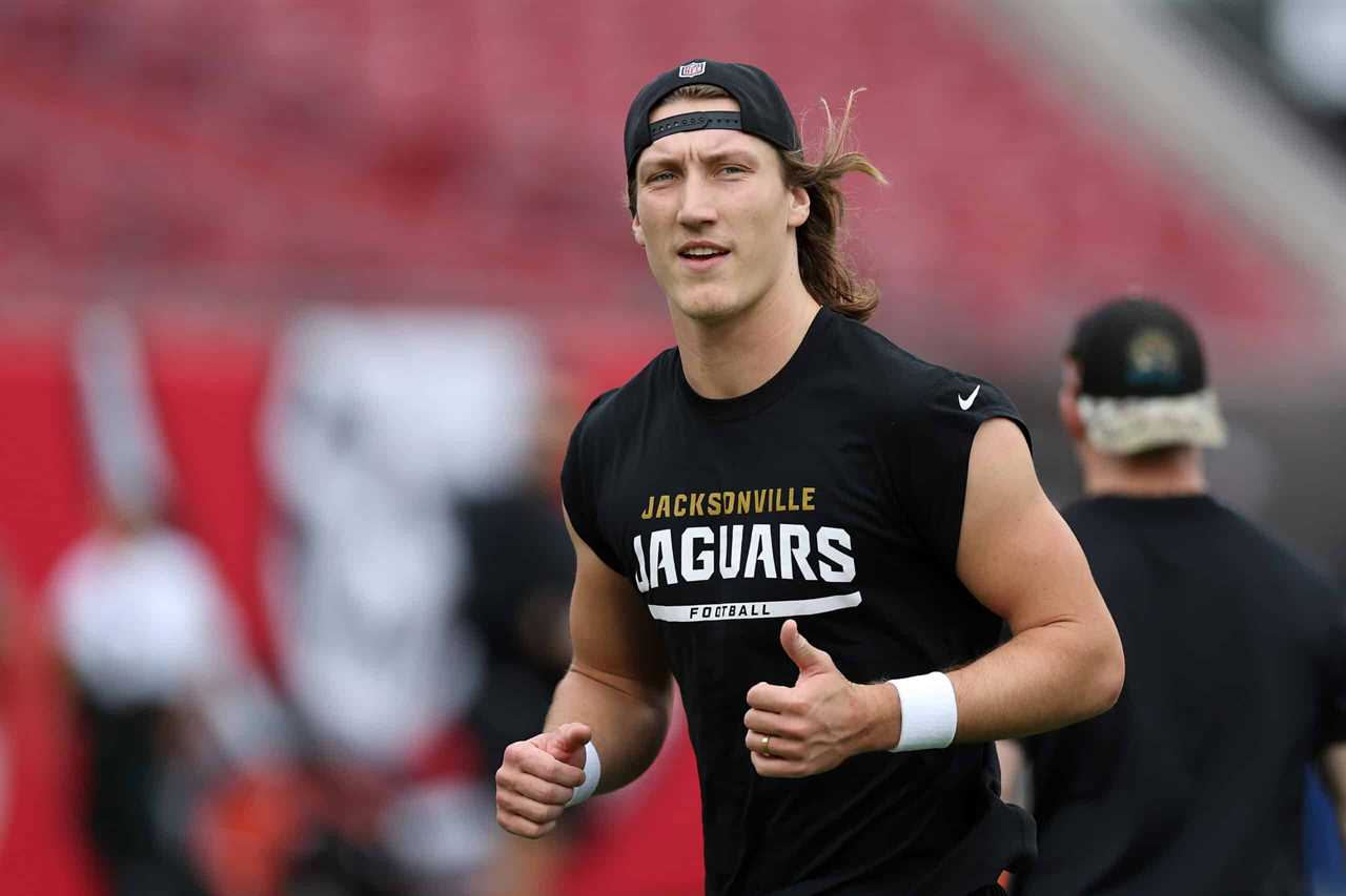 TAMPA, FLORIDA - DECEMBER 24: Trevor Lawrence #16 of the Jacksonville Jaguars warms up prior to the game against the Tampa Bay Buccaneers at Raymond James Stadium on December 24, 2023 in Tampa, Florida.