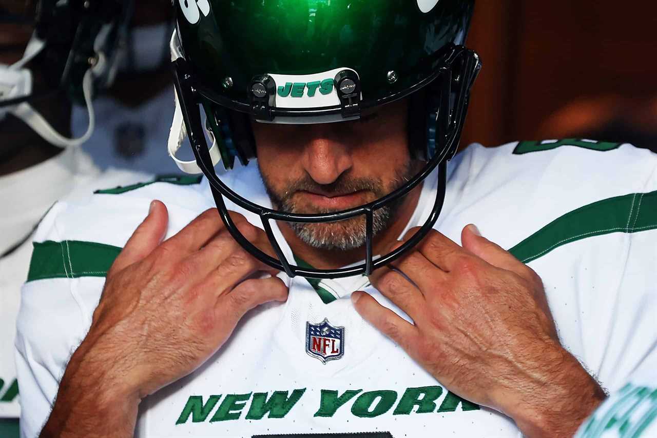 Aaron Rodgers #8 of the New York Jets waits in the tunnel prior to a preseason game against the New York Giants at MetLife Stadium on August 26, 2023 in East Rutherford, New Jersey.