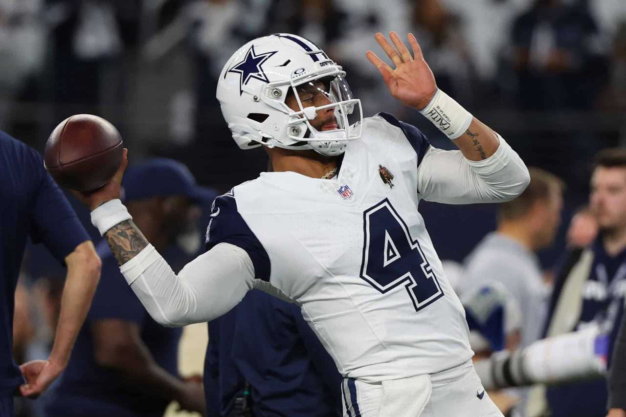 ARLINGTON, TEXAS - DECEMBER 10: Dak Prescott #4 of the Dallas Cowboys warms up prior to a game against the Philadelphia Eagles at AT&T Stadium on December 10, 2023 in Arlington, Texas.