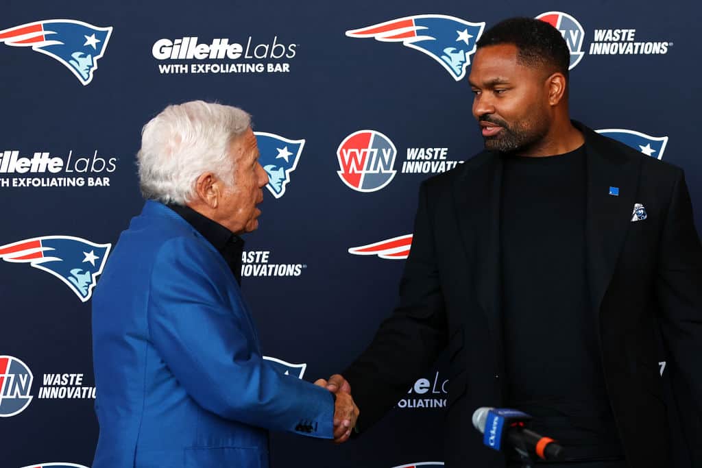 Owner Robert Kraft and newly appointed head coach Jerod Mayo of the New England Patriots shake hands during a press conference at Gillette Stadium on January 17, 2024 in Foxborough, Massachusetts.