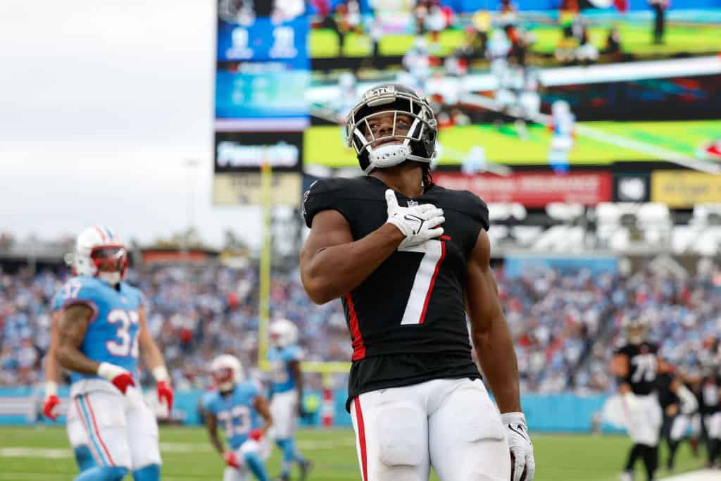 Bijan Robinson #7 of the Atlanta Falcons looks on after scoring a touchdown during the fourth quarter of the game against the Tennessee Titans at Nissan Stadium on October 29, 2023 in Nashville, Tennessee.