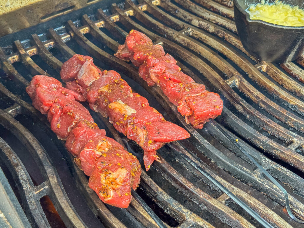 raw sirloin tip skewers on the grill