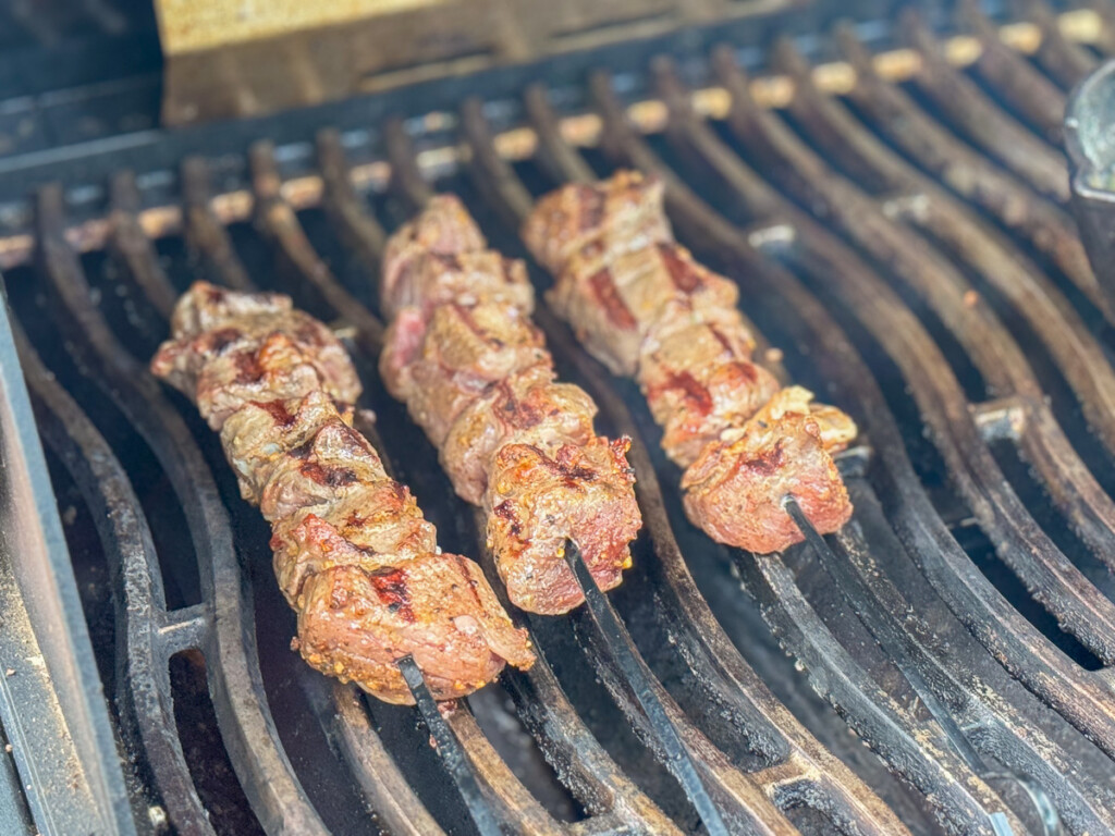 cooked sirloin tip skewers on the grill