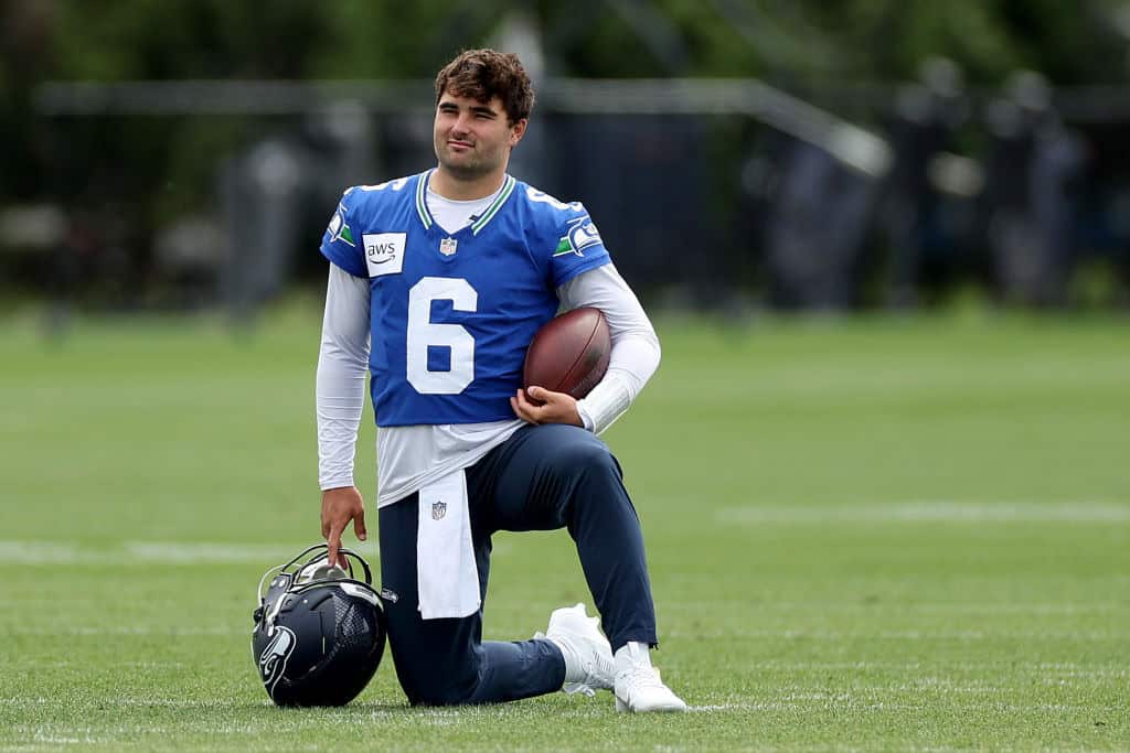  Sam Howell #6 of the Seattle Seahawks looks on during practice at Virginia Mason Athletic Center on June 03, 2024 in Renton, Washington.