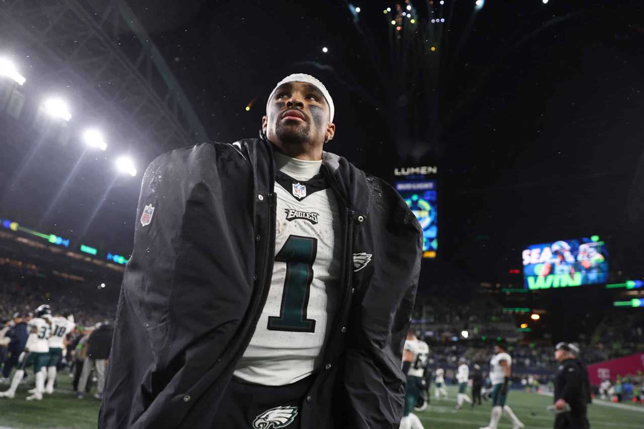 SEATTLE, WASHINGTON - DECEMBER 18: Jalen Hurts #1 of the Philadelphia Eagles walks off the field after the game against the Seattle Seahawks at Lumen Field on December 18, 2023 in Seattle, Washington.
