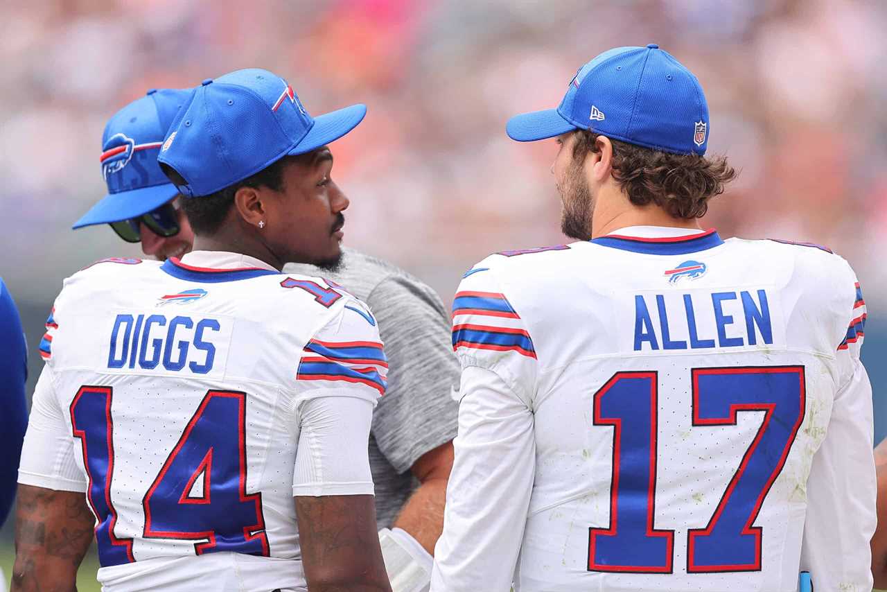 Stefon Diggs #14 and Josh Allen #17 of the Buffalo Bills talk on the sideline during the second half of a preseason game against the Chicago Bears at Soldier Field on August 26, 2023 in Chicago, Illinois.