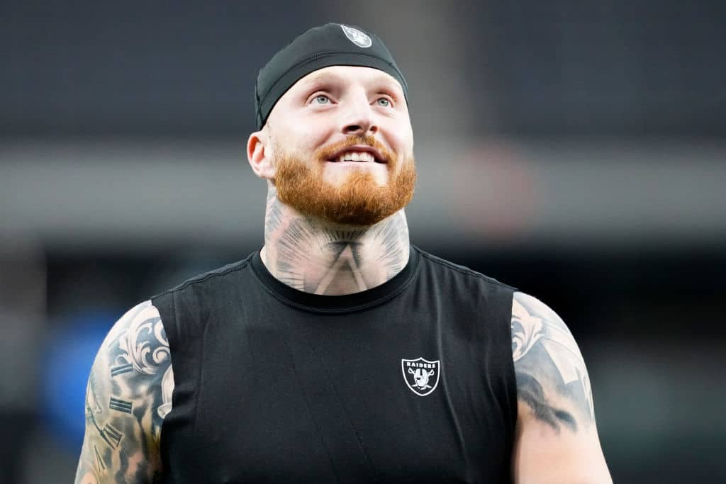 Maxx Crosby #98 of the Las Vegas Raiders warms up prior to a game against the Kansas City Chiefs at Allegiant Stadium on November 26, 2023 in Las Vegas, Nevada.